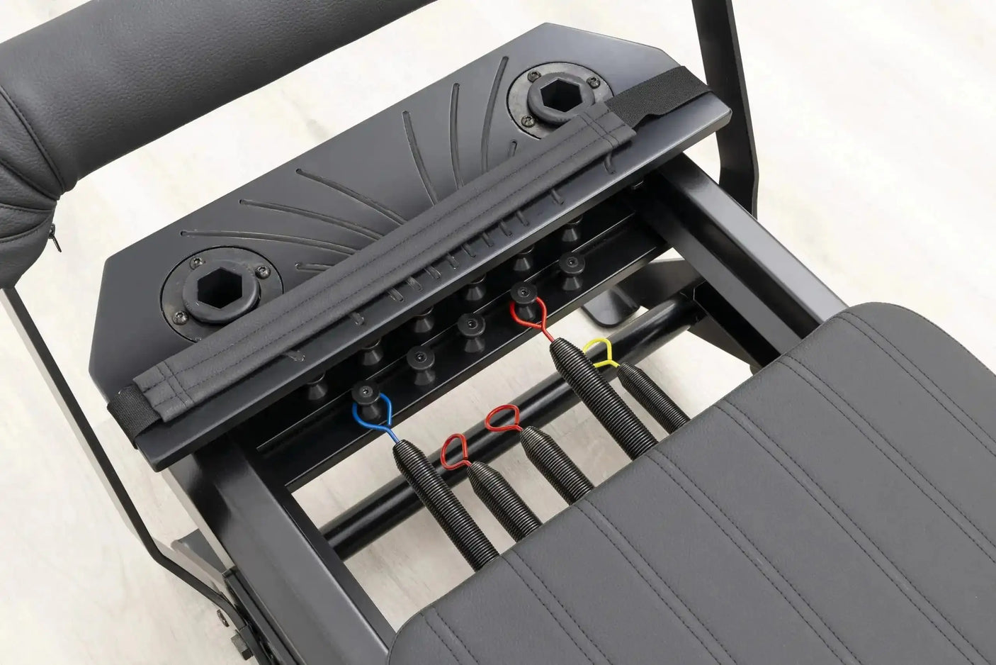 HEGREN Pilates Reformer TALMA 62 Black Elegance showcasing its black steel frame and black upholstery.