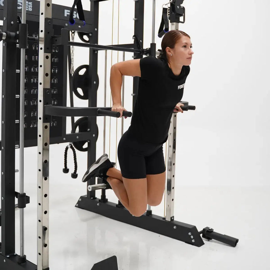 Force USA F50 V2 All-In-One Functional Trainer with multi-grip pull-up bar and integrated storage.