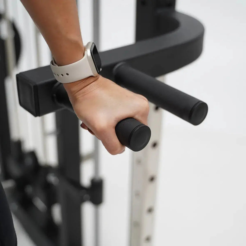 Force USA F50 V2 All-In-One Functional Trainer with multi-grip pull-up bar and integrated storage.