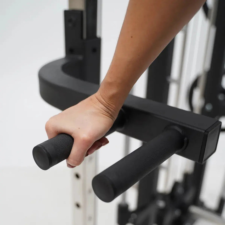 Force USA F50 V2 All-In-One Functional Trainer with multi-grip pull-up bar and integrated storage.