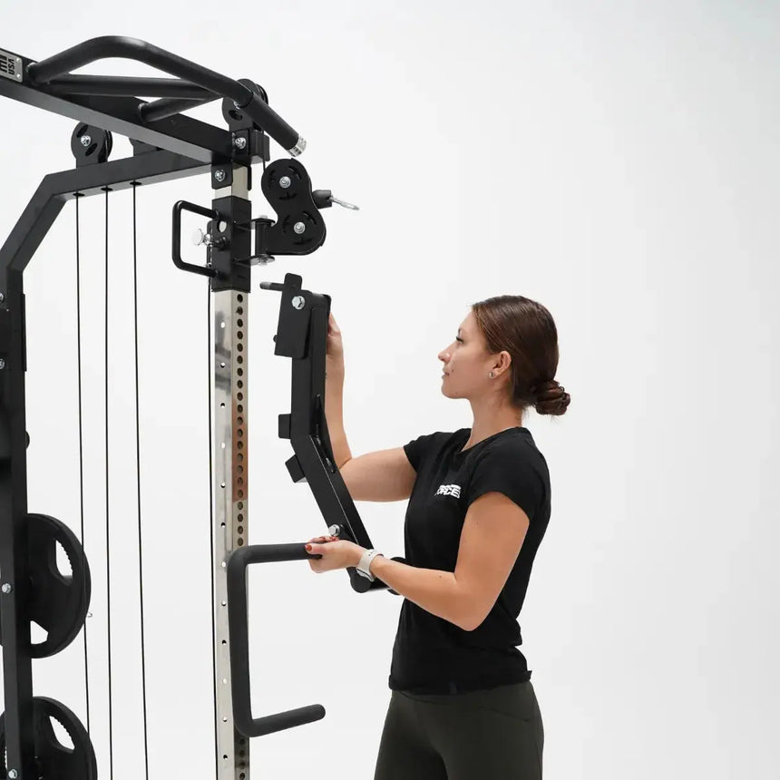 Force USA G9 and G12 Jammer Arms attached to the All-In-One Trainer, demonstrating bench press exercise.