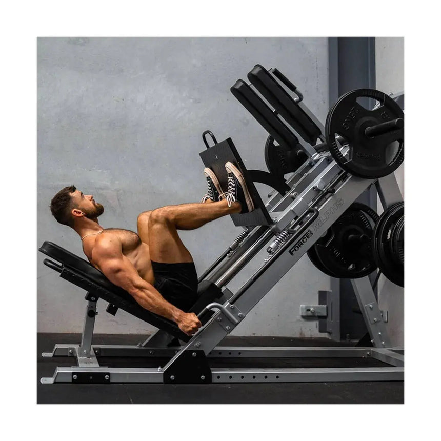 Force USA Ultimate V2 Leg Press Hack Squat Combo showcasing leg press, hack squat, reverse hack squat, and calf raise functionalities.