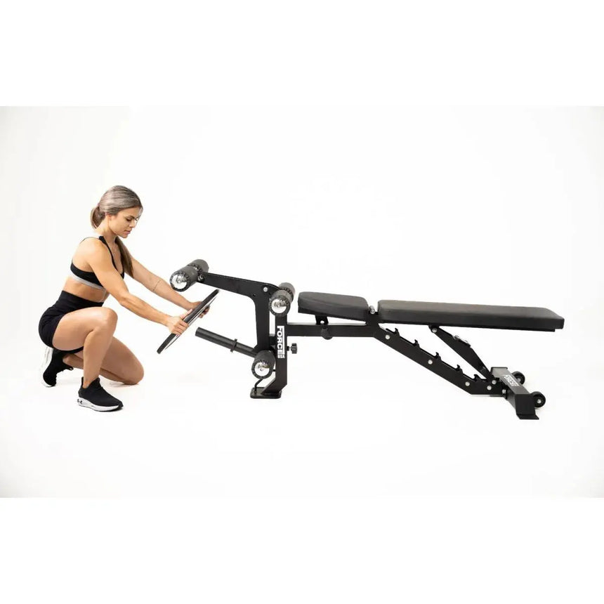 Force USA MyBench V2 – Adjustable training bench with bicep curl and leg development attachments.