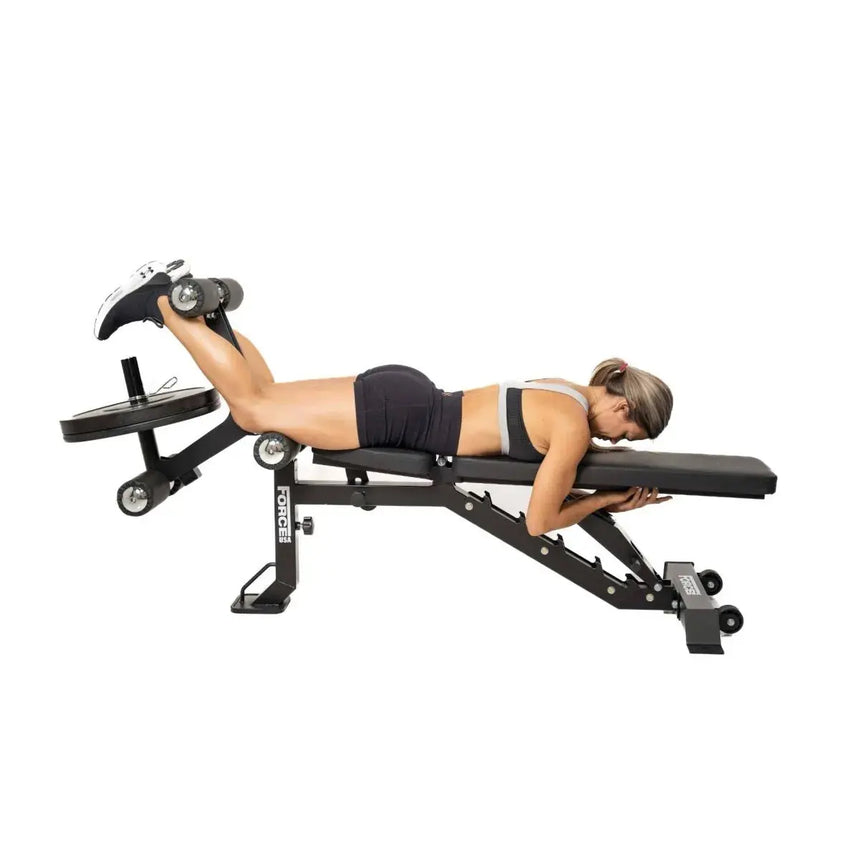 Force USA MyBench V2 – Adjustable training bench with bicep curl and leg development attachments.