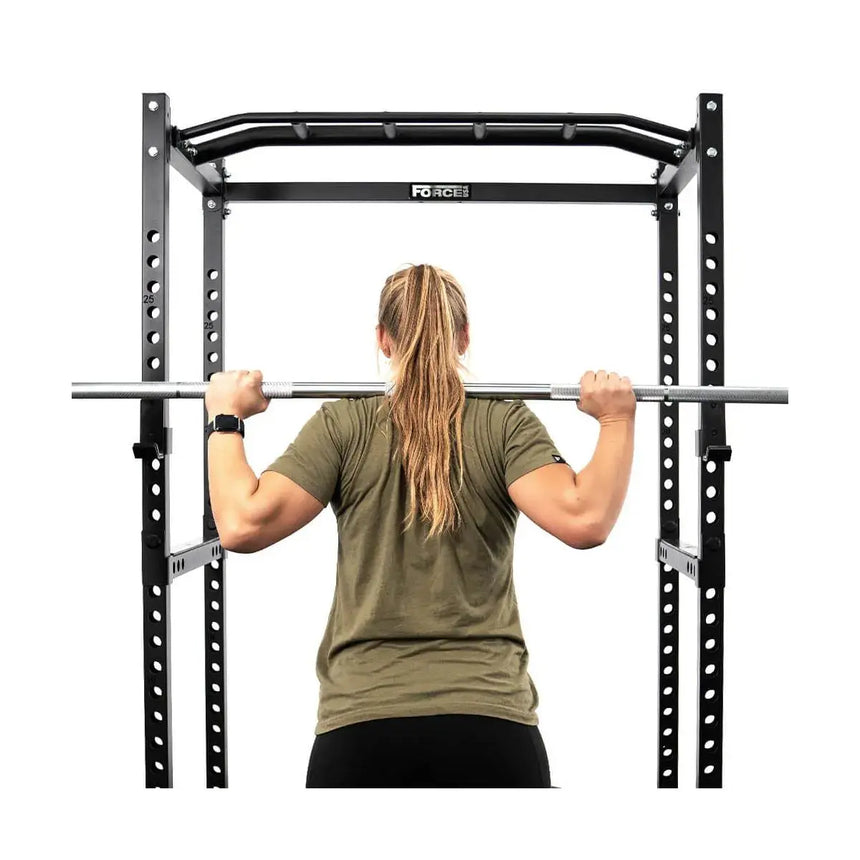 Force USA PT V2 Power Rack with integrated lat pulldown and low row attachment, featuring a sturdy steel frame and adjustable components.