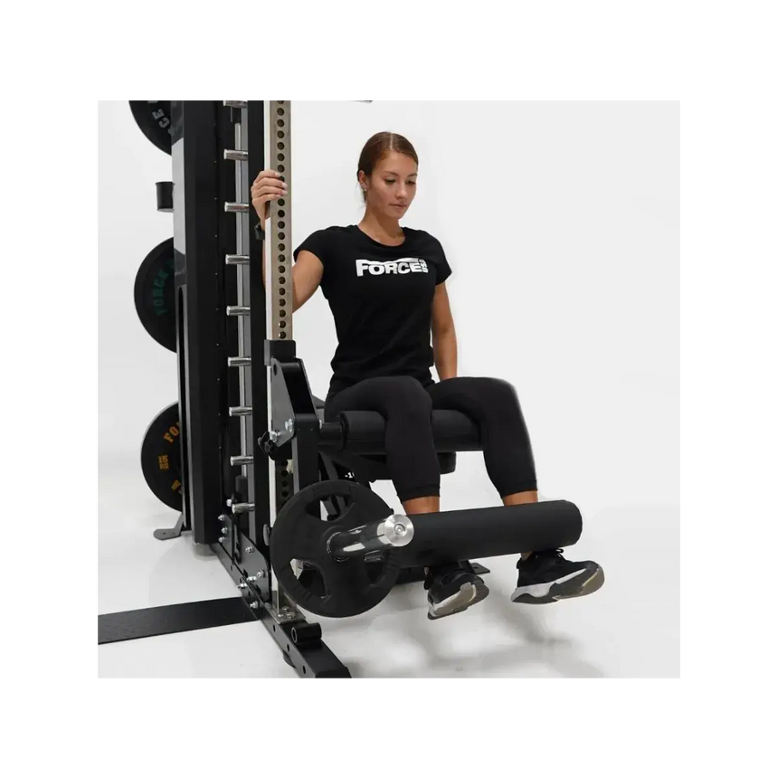 Force USA G-Series Leg Extension and Curl Attachment connected to the G-Series All-In-One Trainer.