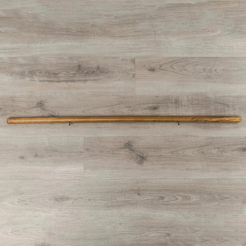 HEGREN Pilates Wooden Stick 1.10m with connecting links, crafted from polished solid oak, designed for balance and flexibility exercises.