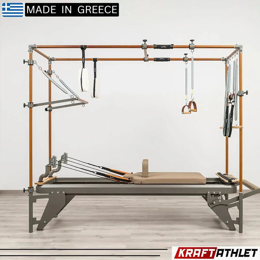 Side view of the HEGREN Cadillac Reformer TALMA 62CR showcasing its steel frame and beige upholstery.