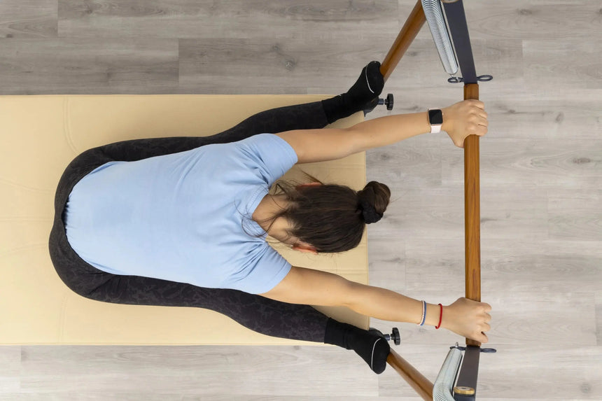 Side view of the HEGREN Cadillac Trapeze TALMA TRC showcasing its steel frame and beige upholstery.