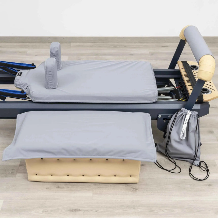 Set of six custom-fitted, non-slip, and washable covers for the Pilates Reformer TALMA 62, displayed in various colors.