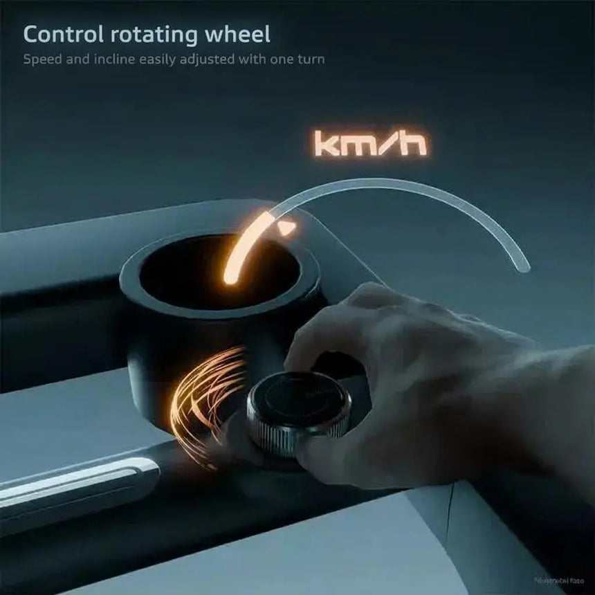 Hand adjusting a control wheel on a vehicle with 'km/h' display of the Insportline Zenrun 50 Treadmill