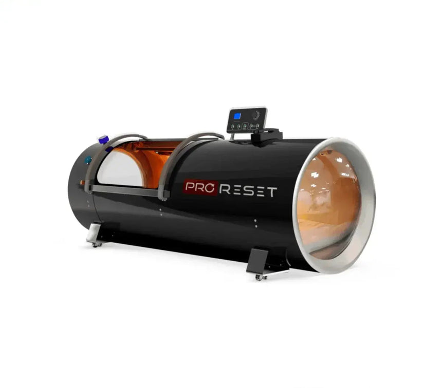 "ProReset Orbit portable hyperbaric chamber with reclining lounge chair and four viewing windows."