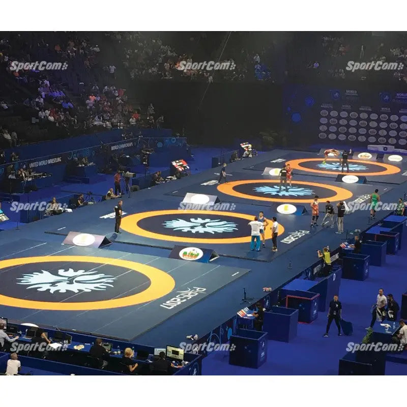 SportCom Flexi-Roll Ringermatte von Dollamur, mehrere Ringermatten in einer Wettkampfarena