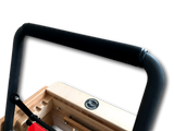 Close-up of a wooden product with black metal frame on a white background