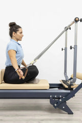 HEGREN Stability Bar Stand mounted on a wall, designed to securely hold the Stability Bar when not in use.