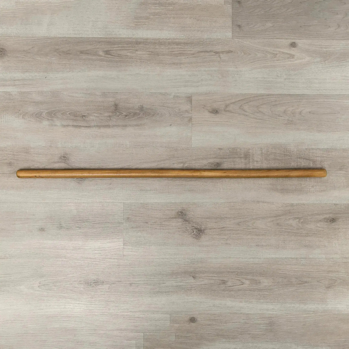 HEGREN Pilates Wooden Stick (1.10m) designed to enhance balance and flexibility during Reformer exercises