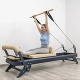 HEGREN Pilates Wooden Stick (1.10m) designed to enhance balance and flexibility during Reformer exercises