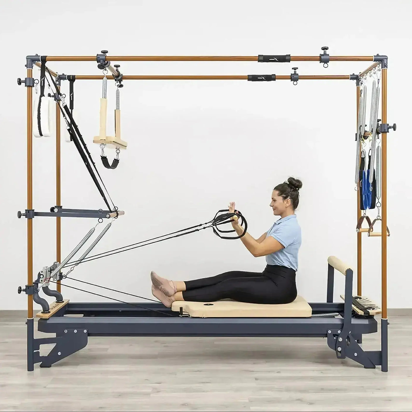 HEGREN Pilates Wooden Stick (1.10m) designed to enhance balance and flexibility during Reformer exercises