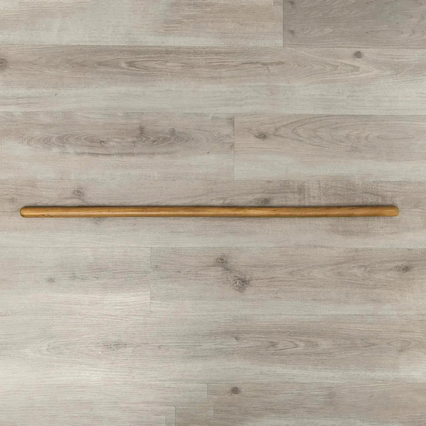 HEGREN Pilates Wooden Stick (1.10m) designed to enhance balance and flexibility during Reformer exercises