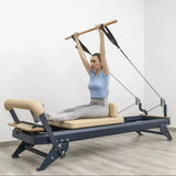 HEGREN Pilates Wooden Stick (1.10m) designed to enhance balance and flexibility during Reformer exercises