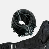 Aerify Leg Cuffs für Charge mit aufgerolltem Anschlussschlauch und schwarzer Beinmanschette