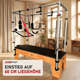 Body & Exercise Cadillac Classic aus Buchenholz in einem hellen Pilates-Studio mit Holz und Leinen