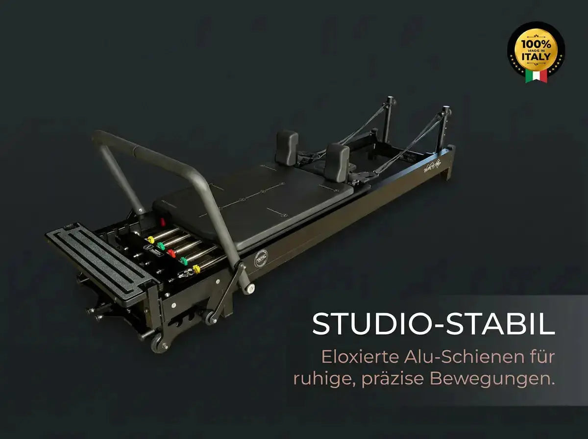 Body & Exercise Reformer Black Edition Grafik mit Schrägansicht und Hinweis auf eloxierte Alu-Schienen