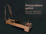 Body & Exercise Reformer Studio Tower P002 aus Holz, Seitenansicht mit Hinweis auf Umschalten zwischen Reformer und Wall Unit