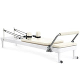 Elina Pilates Nubium Reformer mit Polster in Elfenbein, Schrägansicht