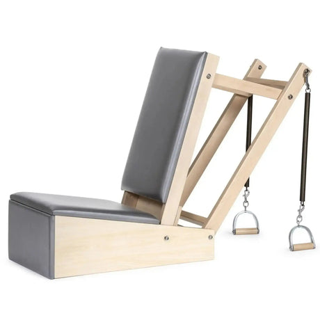 Elina Pilates Baby Chair aus Ahornholz – Seitenansicht mit grauem Polster und Federn