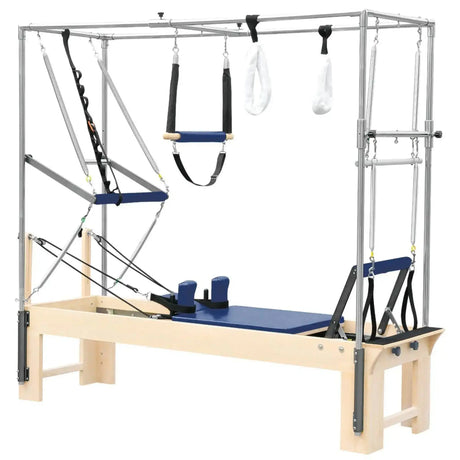 Elina Pilates Cadillac Reformer aus Rock-Ahorn – Schrägansicht mit Trapezrahmen und Polstern in Blau