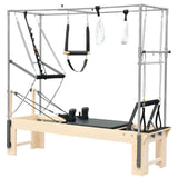 Elina Pilates Cadillac Reformer aus Rock-Ahorn – Schrägansicht mit Trapezrahmen und Polstern in Schwarz