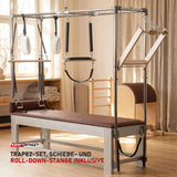 Elina Pilates Classic Cadillac aus Aluminium in einem hellen Pilates-Studio mit Holz und Leinen