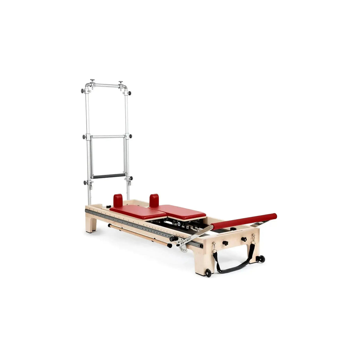 Elina Pilates Twin Reformer aus Ahornholz mit roten Polstern, Seitenansicht mit Turm auf weißem Hintergrund
