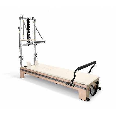 Elina Pilates Twin Reformer with ivory-colored padding, side view with tower on a white background