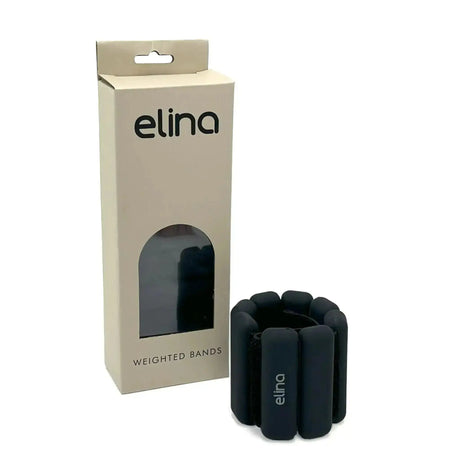 Elina Pilates verstellbare Gewichte 0,5 kg für Handgelenk und Knöchel in Schwarz vor der beigen Verpackungsbox