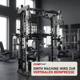 Force USA G9 All-In-One Trainer in einem fertig eingerichteten Studio mit dunklen Wänden und Gummiboden