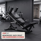 Force USA Kompakte Beinpresse & Hack Squat V3 in einem fertig eingerichteten Studio mit dunklen Wänden und Gummiboden