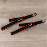 Hegren Double Loop Straps, Paar Schlaufen in Schwarz-Rot auf Holzboden