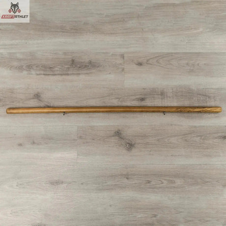 Hegren Pilates Stick 1,10 m mit Verbindungsgliedern, Draufsicht auf den Holzstab am Boden