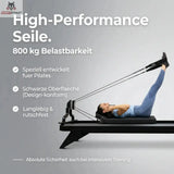 Hegren TALMA 62 Black Elegance Reformer mit Frau in Rückenlage und Hinweis auf die Seile