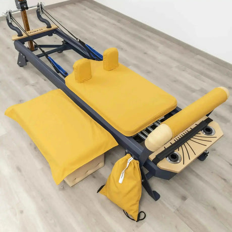 Hegren TALMA 62 Covers Collection Bezugset in Gelb auf Reformer, Box und Kopfstütze mit Beutel