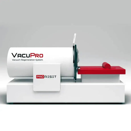 ProReset VacuPro Vakuum-Wellnesssystem – Seitenansicht in Weiß mit roter Liegefläche