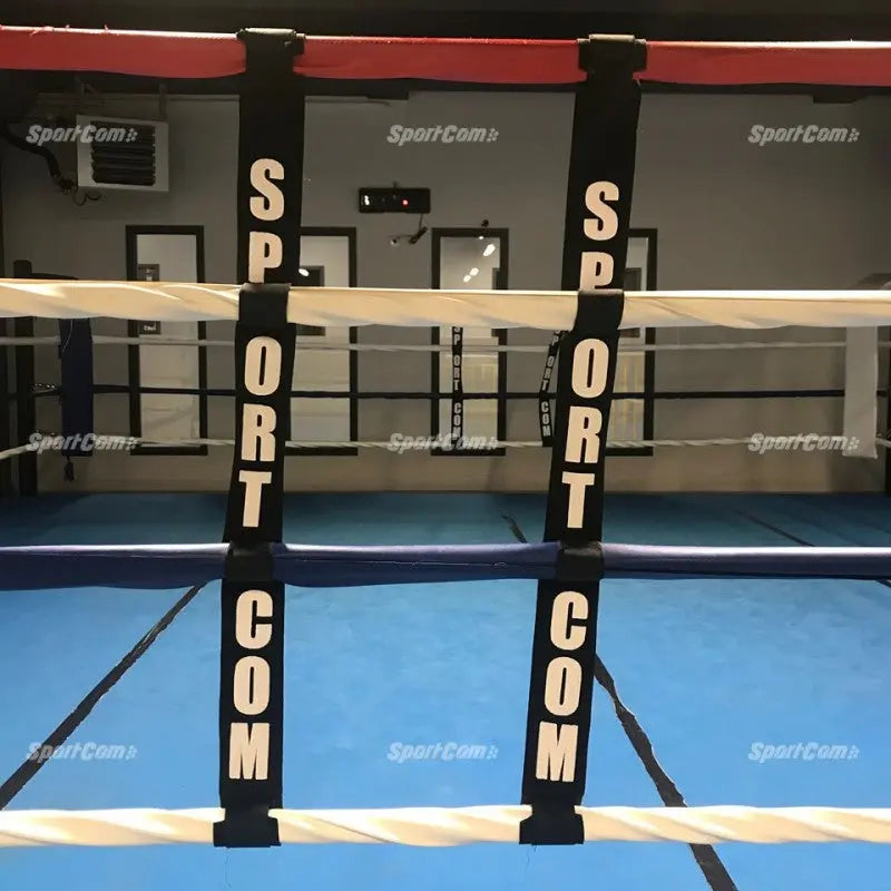 SportCom Boxring-Seiltrenner 8er-Set, zwei Trenner mit großem Schriftzug an einem Ring mit blauem Boden