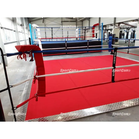 SportCom Ecofix Bodenmontage-Boxring mit Aluminiumrand, Detail der roten Ecke mit Seilspanner