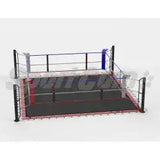 SportCom Ecofix Boxring mit Bodenhülsen, Schrägansicht mit schwarzem Boden, roter Umrandung und vier Seilen