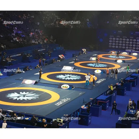 SportCom Flexi-Roll Ringermatte von Dollamur, mehrere Ringermatten in einer Wettkampfarena