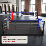 SportCom Freistehender Boxring in einem hellen Boxstudio mit Backsteinwand