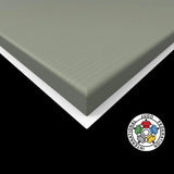 SportCom Judo-Tatami Reisstroh 2 × 1 m, 5 cm, glatte Unterseite, Detail der olivgrünen Kante mit weißer Unterseite