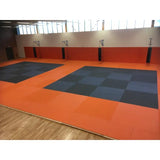 SportCom MMA-Tatami Glattfinish 1 × 1 m, 5 cm, glatte Unterseite, orange Fläche mit schwarz-grauem Schachbrettfeld